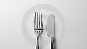 Clean and minimalistic design of the flatware against the plain