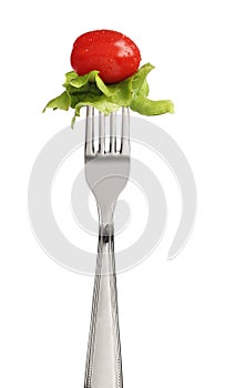 Fork with letucce and tomato