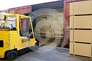 Fork Lift Truck loading industrial railway carriage