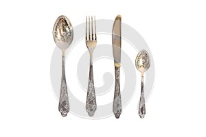 Fork, spoon, small spoon and knife