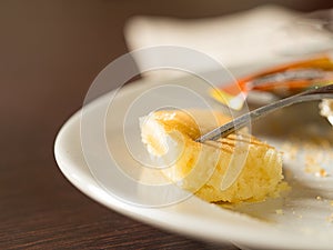 Fork stab on piece of pancake dessert. Diet and healthy concept