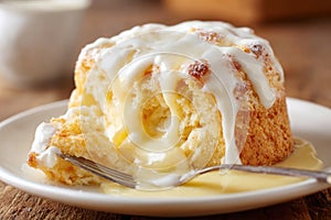 Fork Taking First Bite Cream Puff Cake Slice