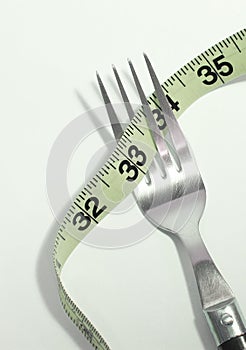 Fork and tape measure