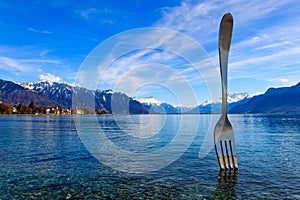 Fork of Vevey is 8 metre stainless steel fork in water of Lake Geneva in Vevey, Switzerland