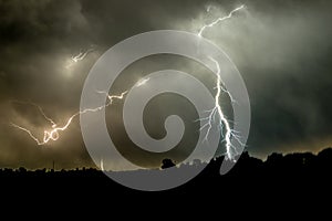 A forked lightning bolt strikes down on the Great Plains in Nebraska, USA.