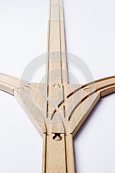 Forked railroad track on grey background photo