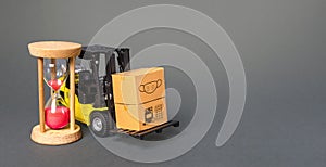 Forklift with boxes and hourglass. Urgent delivery of medicines and medical protective masks. Supply hospitals and populations to