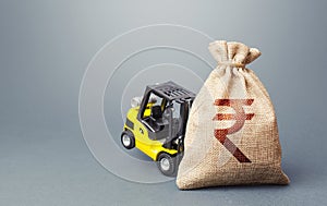 A forklift cannot lift a Indian rupee money bag. Stimulating economy. Strongest financial assistance, support of business