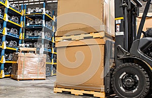 Forklift cardboard boxes in a store warehouse automotive part