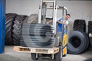 Forklift carries sell car tires