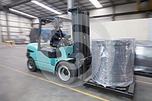 Forklift carrying cargo