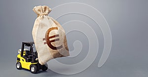 A forklift carrying a huge euro money bag. EU anti-crisis budget. Borrowing on capital market. Stimulating economy. Subsidies soft