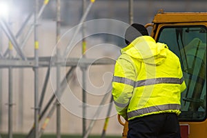 Forklift driver at the construction site