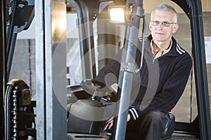 Forklift driver posing