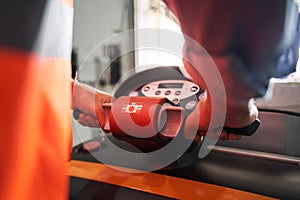 Forklift driver at warehouse of forwarding