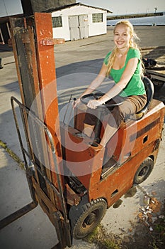 Forklift with female driver