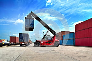 Forklift handling the container