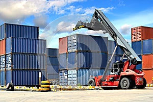 Forklift handling the container