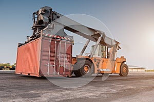 Forklift handling container box loading