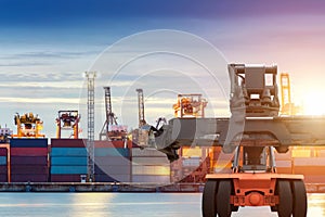 Forklift handling container box loading at port cargo