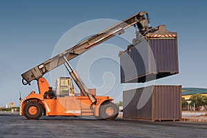 forklift handling holding container box