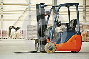 Forklift loader stacker truck at warehouse