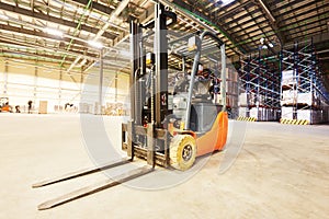 Forklift loader stacker truck at warehouse