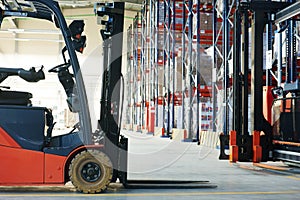 Forklift loader stacker truck at warehouse