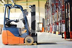 Forklift loader stacker truck at warehouse