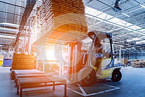 Forklift loader in storage warehouse ship yard. Distribution products.