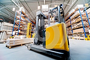 Forklift loader in storage warehouse ship yard. Distribution products.