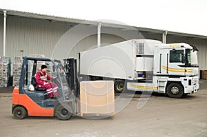 Forklift loader at warehouse