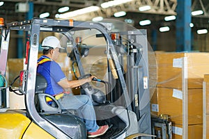 Forklift are loading into cargo containers at warehouses, ports, freight forwarding, cargo supply chains, cargo transportation,