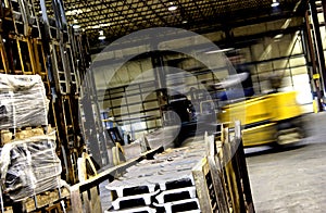 Forklift moving in factory