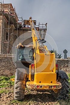 Forklift in the restoration work of a church in Spain