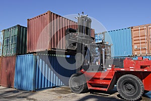 Forklift stacking containers