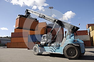 Forklift stacking containers