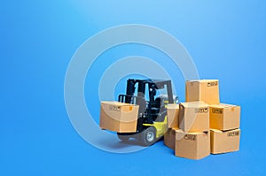 Forklift truck with cardboard boxes. Transportation logistics infrastructure, import and export goods and products delivery. Produ