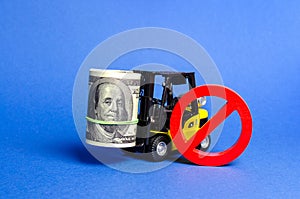 Forklift truck carries a big bundle of dollars and red symbol NO. Restrictions on the export of capital, Economic pressure