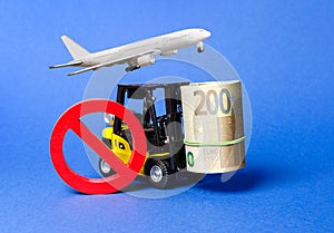 Forklift truck carries a big bundle of Euros and red symbol NO and airplane. Restrictions on the export of capital, Economic