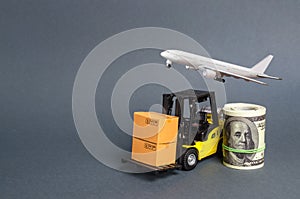 A forklift truck carries cardboard boxes near a dollar roll and airplane. Transport company. Performance efficient. Trade