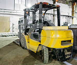 Forklift Truck inside warehouse or factory