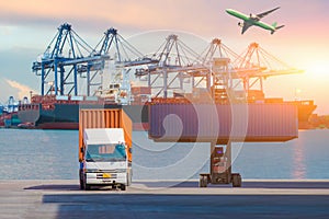 Forklift truck lifting cargo container in shipping yard or dock yard against sunrise sky for transportation import, Export and log