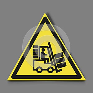 Forklift truck sign. Symbol of threat alert. Hazard warning icon. Black lift-truck with the silhouette of a man emblem in