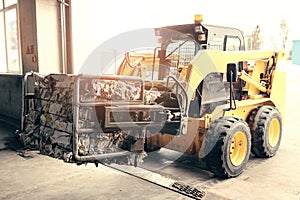 Forklift truck. Waste processing plant. Technological process. Recycling and storage of waste for further disposal