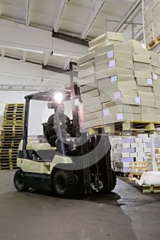 Forklift in warehouse