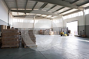 Forklift in warehouse photo