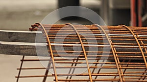 Forklifter loading and unloading metal mesh into truck