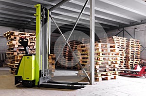 Forklifter stacker in warehouse