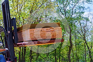 Forklifts in the construction of a built home under construction house